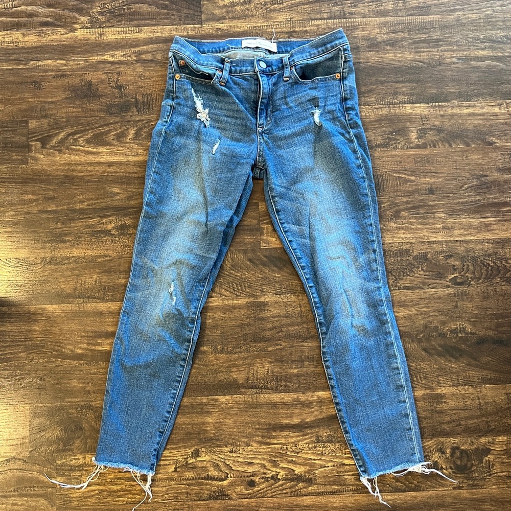 Distressed Blue Jeans